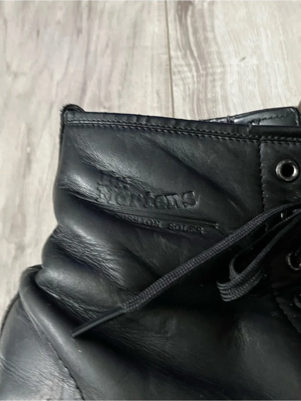 Dr. Martens Black Leather Lace-Up Combat Boots with Yellow Stitching